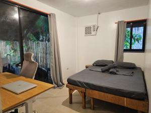 Ein Bett oder Betten in einem Zimmer der Unterkunft The Surf House Pacifico