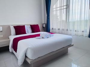White Seaview Residence客房内的一张或多张床位