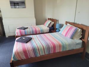 Postel nebo postele na pokoji v ubytování Australia Hotel Fremantle
