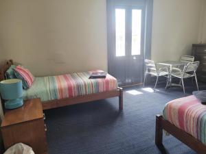 Postel nebo postele na pokoji v ubytování Australia Hotel Fremantle