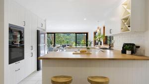 Kuchyň nebo kuchyňský kout v ubytování Cedar Corner + 30 fotografií