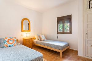 Katil atau katil-katil dalam bilik di Apartamento en Jávea, cerca de la Caleta +12 gambar
