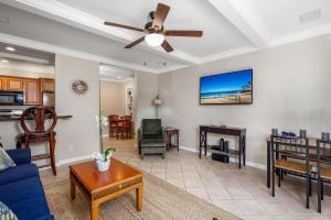 Μια τηλεόραση ή/και κέντρο ψυχαγωγίας στο Kona Mansions#124