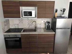 Afbeelding uit fotogalerij van La Cigale du Pyla, au cœur de l'écoquartier avec piscine commune in La Teste-de-Buch