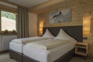 Postel nebo postele na pokoji v ubytování Haus Barbara