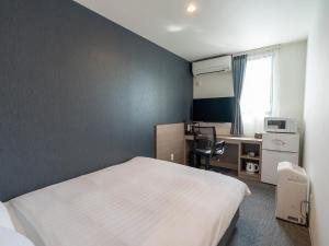Televisyen dan/atau pusat hiburan di HOTEL R9 The Yard Isesaki