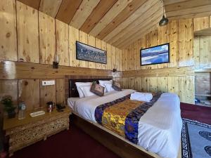 Postel nebo postele na pokoji v ubytování Pangong Pearl