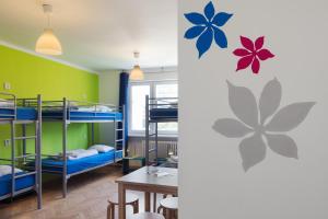 Postel nebo postele na pokoji v ubytování Patio Hostel Dorms