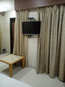 TV a/nebo společenská místnost v ubytování MNR Resort