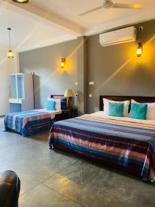 Rúm í herbergi á Hotel Vibration