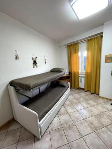 - une chambre avec 2 lits superposés dans l'établissement La Casetta dell Horizonte, à Roccaraso