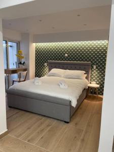 Postel nebo postele na pokoji v ubytování Hideaway Boutique