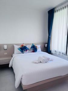 White Seaview Residence客房内的一张或多张床位