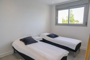 Łóżko lub łóżka w pokoju w obiekcie Modern 3 bedroom apartment in Mijas Costa - Vitta Nature