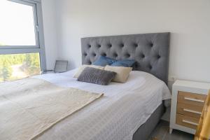 Łóżko lub łóżka w pokoju w obiekcie Modern 3 bedroom apartment in Mijas Costa - Vitta Nature
