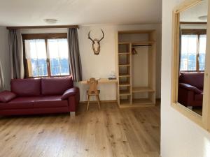 Posezení v ubytování Hotel Garni Postigliun Andiast
