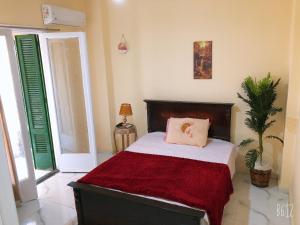 Postel nebo postele na pokoji v ubytování Sweet Home Downtown Cairo