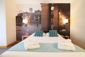 Postel nebo postele na pokoji v ubytování ELE Enara Boutique Hotel