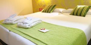 Postel nebo postele na pokoji v ubytování ELE Enara Boutique Hotel