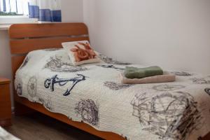 Łóżko lub łóżka w pokoju w obiekcie Apartment Nolan