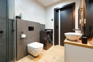Ванная комната в Apartament Kamienne Wzgórze 3 - Dream Apart +10 фотографий