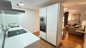 Ett kök eller pentry på Apartamento Sant Josep con parking gratuito By El Conserje