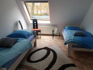 Katil atau katil-katil dalam bilik di NEU! FeWo Maya mit Sauna