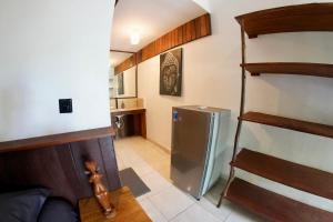 uma cozinha com um frigorífico num quarto em Jepun Villa 05 - One Bedroom without kitchen em Uluwatu