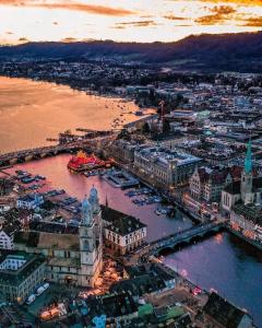 an aerial view of a city with a harbor at Lion BB Swiss in Zurich