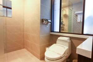 A bathroom at Rosana Hotel