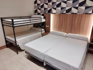 Postel nebo postele na pokoji v ubytování Hotel Camino Real