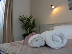 Postel nebo postele na pokoji v ubytování Green Guest House