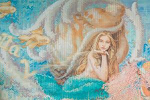 a painting of a mermaid on a wall at Albergo Dipinto BaccoFurore in Furore