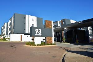 a building with a sign that reads current at Elcaro Luxury Villas-Royal Abode in Midrand