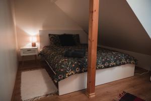 a bedroom with a bunk bed with a pole at Viljandi Jahiloss in Viljandi +15 photos