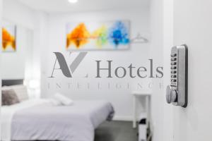 Cama o camas de una habitación en AYZ Ulises - Auto check-in property