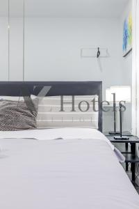 Cama o camas de una habitación en AYZ Ulises - Auto check-in property