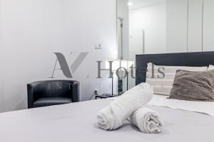 Cama o camas de una habitación en AYZ Ulises - Auto check-in property