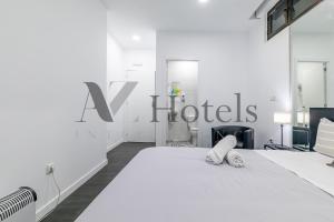 Cama o camas de una habitación en AYZ Ulises - Auto check-in property