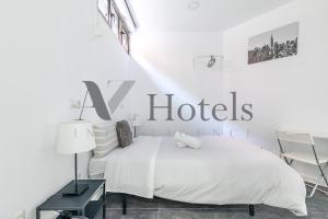 Cama o camas de una habitación en AYZ Ulises - Auto check-in property