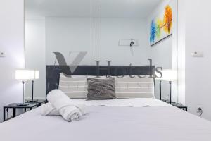 Cama o camas de una habitación en AYZ Ulises - Auto check-in property