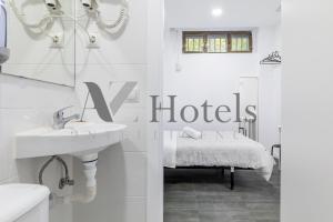 Cama o camas de una habitación en AYZ Ulises - Auto check-in property