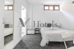 Cama o camas de una habitación en AYZ Ulises - Auto check-in property