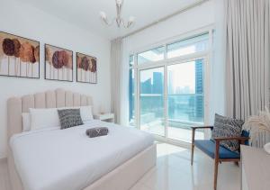 Fotografie z fotogalerie ubytování Magnificent 2BR with mesmerizing Marina Views v Dubaji