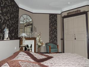 Postel nebo postele na pokoji v ubytování Loire, Châteaux, et Vignes