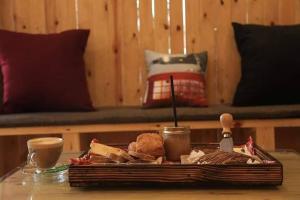 a tray of bread and sandwiches on a table at MONDIAL HOTEL in Tunis