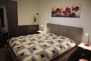 Ένα ή περισσότερα κρεβάτια σε δωμάτιο στο Park-Apartment Scharmützelsee Wohnung 13