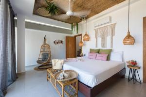 Postel nebo postele na pokoji v ubytování Villa Manglar + 30 fotografií