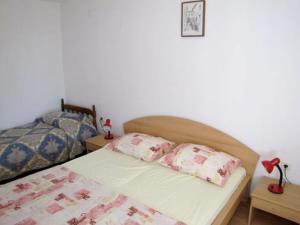 Posteľ alebo postele v izbe v ubytovaní Apartments Josip