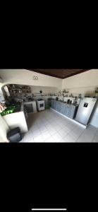 a kitchen with counters and appliances in a room at Elgon View House in Eldoret